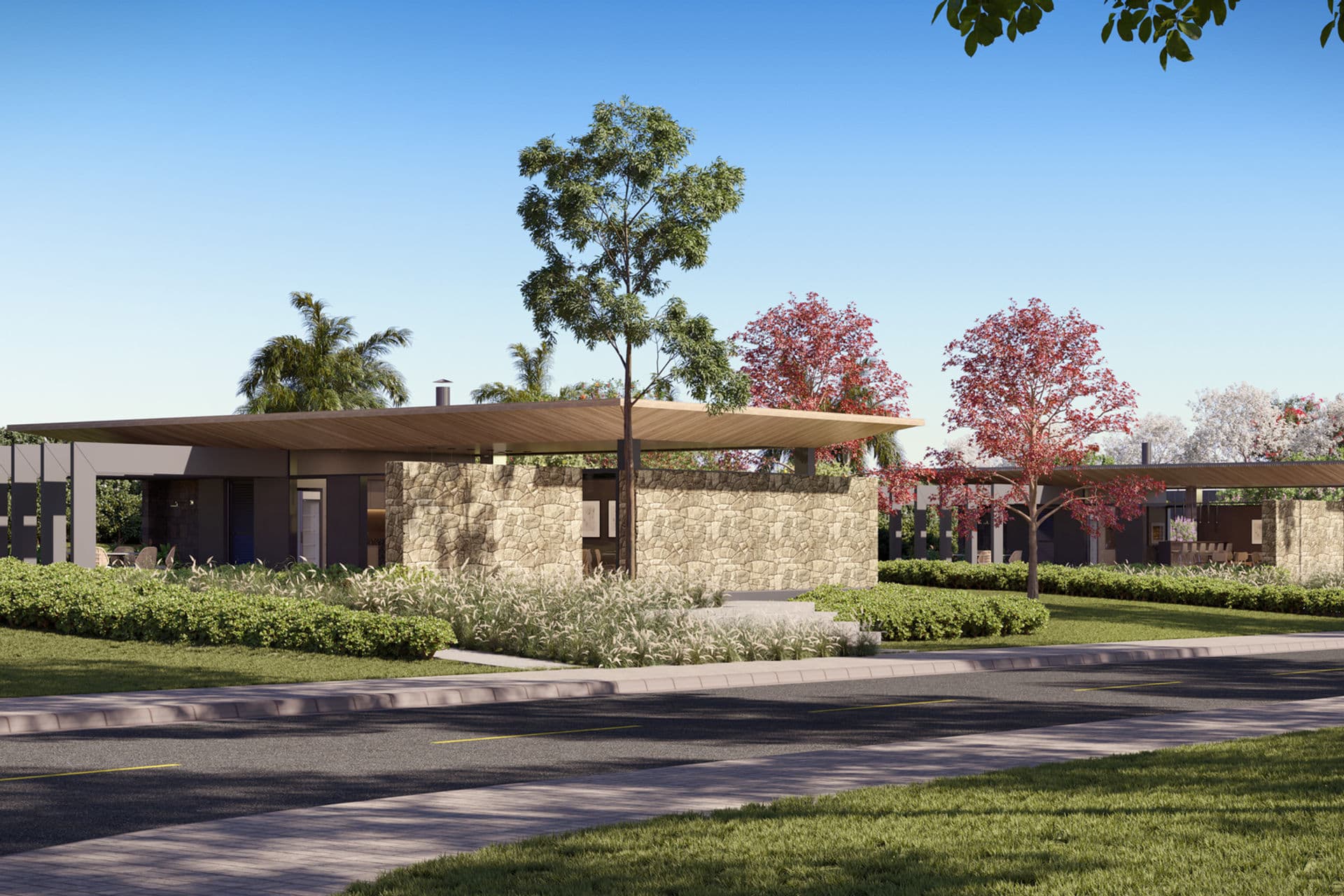 Render de edificação do Vila Noah integrada a jardins, ipês floridos e vegetação